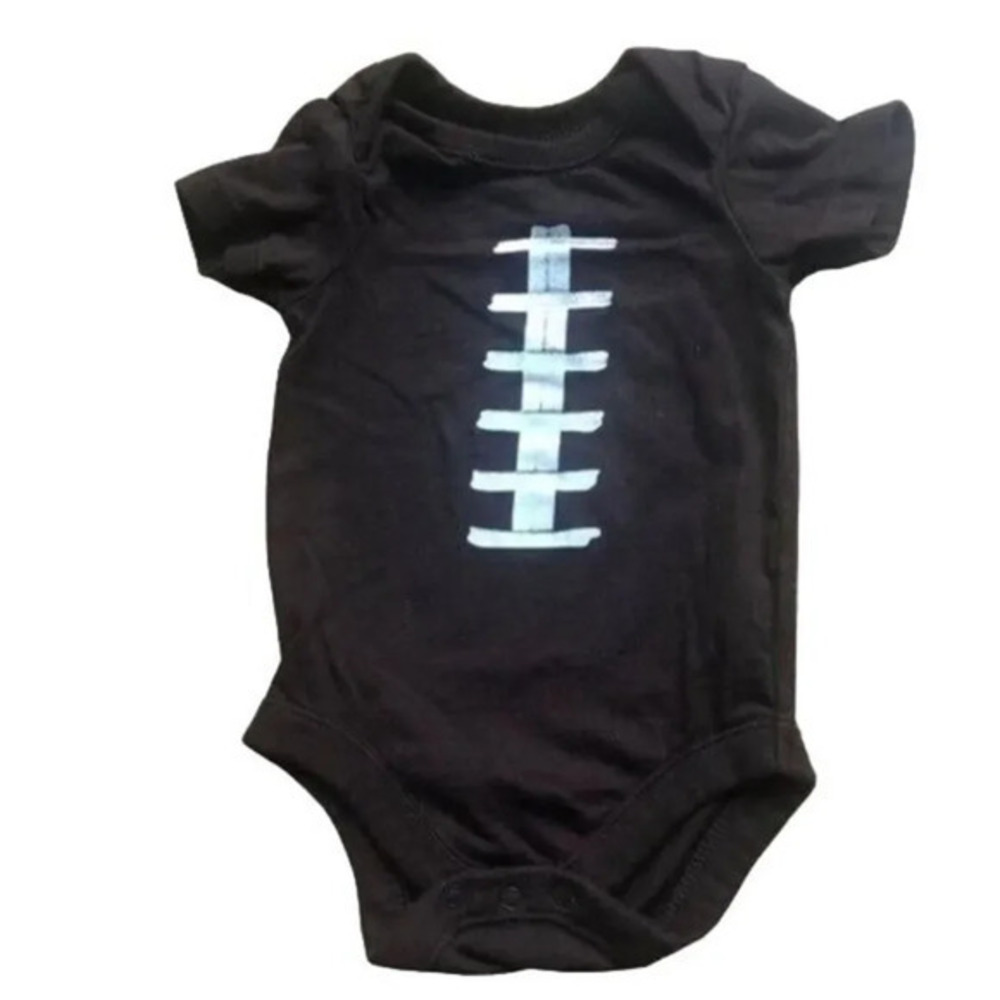 The‎ children place brown boys tee size 0-3M.